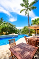 amor-boutique-hotel-in-sayulita-resort-pool-palm-chairs