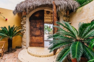 amor-boutique-hotel-la-paz-metal-doors-palapa-roof-ocean-view
