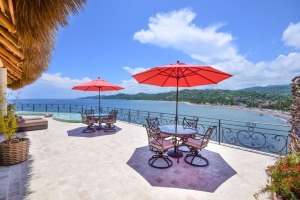 amor-boutique-hotel-villa-romance-ocean-view-terrace-umbrellas